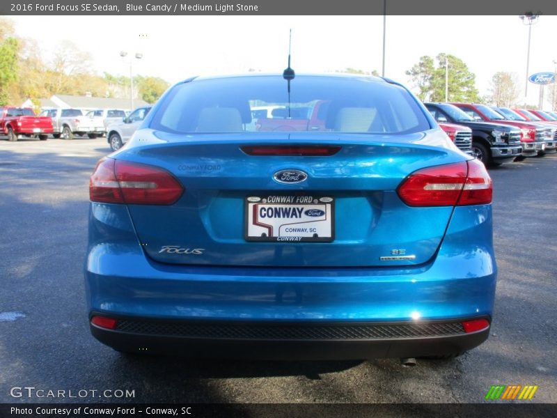 Blue Candy / Medium Light Stone 2016 Ford Focus SE Sedan