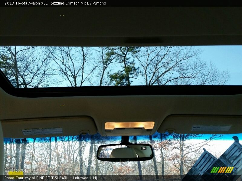 Sizzling Crimson Mica / Almond 2013 Toyota Avalon XLE