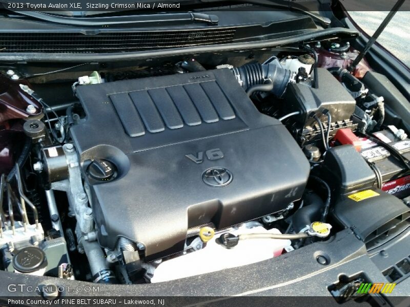 Sizzling Crimson Mica / Almond 2013 Toyota Avalon XLE