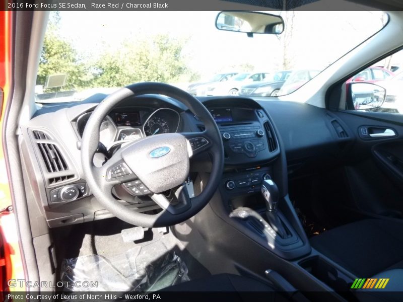 Race Red / Charcoal Black 2016 Ford Focus SE Sedan
