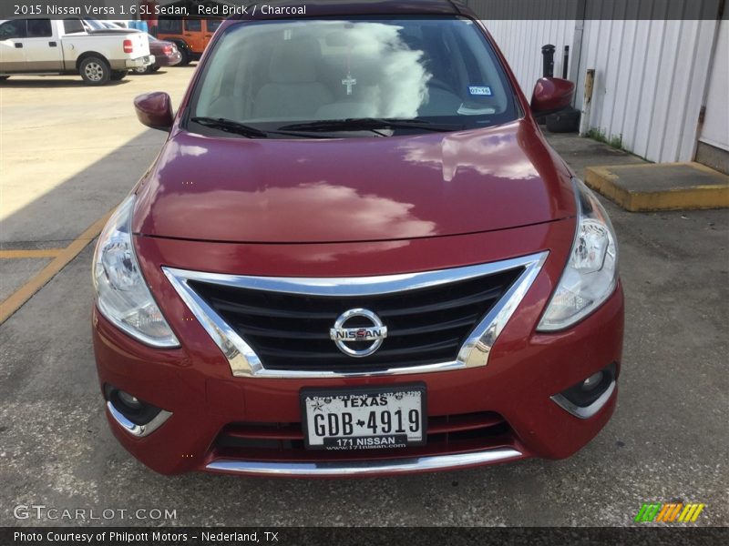 Red Brick / Charcoal 2015 Nissan Versa 1.6 SL Sedan