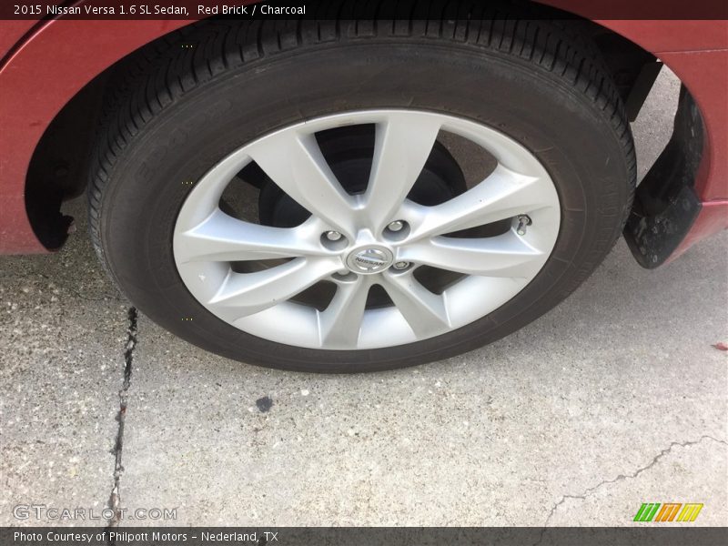 Red Brick / Charcoal 2015 Nissan Versa 1.6 SL Sedan