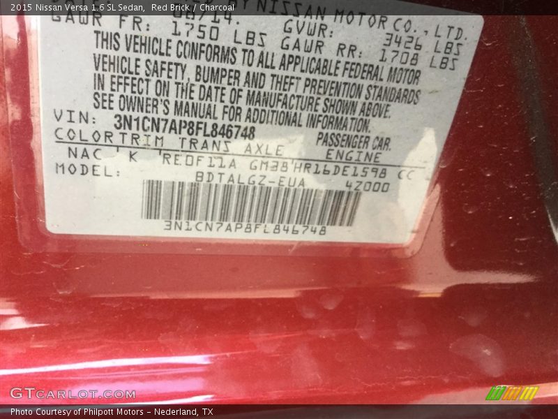 Red Brick / Charcoal 2015 Nissan Versa 1.6 SL Sedan