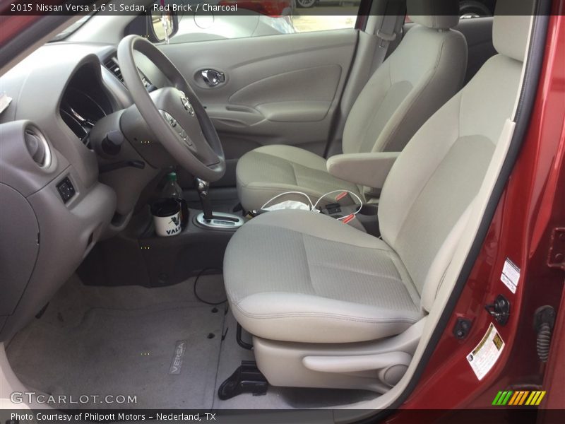 Red Brick / Charcoal 2015 Nissan Versa 1.6 SL Sedan