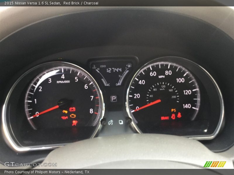 Red Brick / Charcoal 2015 Nissan Versa 1.6 SL Sedan