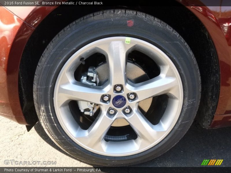 Bronze Fire Metallic / Charcoal Black 2016 Ford Fusion SE