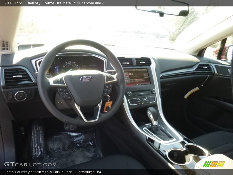 Bronze Fire Metallic / Charcoal Black 2016 Ford Fusion SE