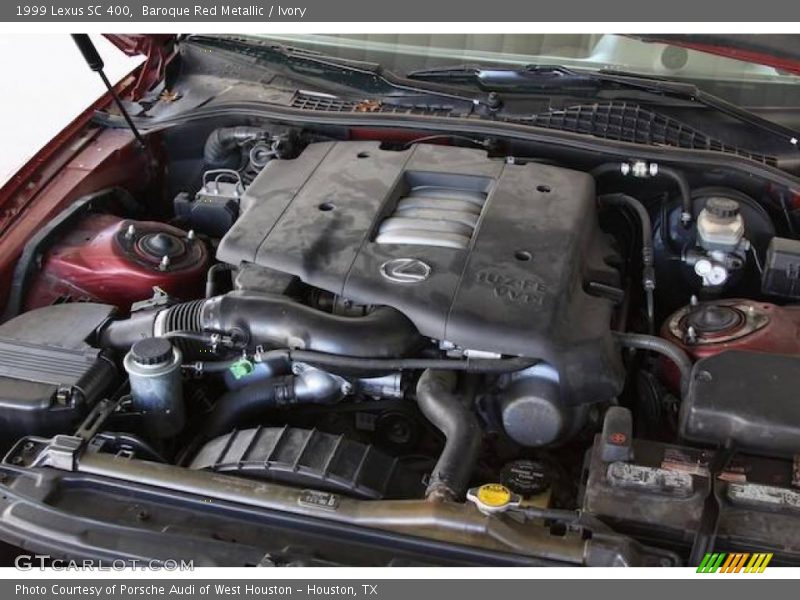 Baroque Red Metallic / Ivory 1999 Lexus SC 400
