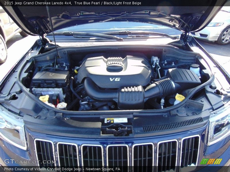 True Blue Pearl / Black/Light Frost Beige 2015 Jeep Grand Cherokee Laredo 4x4