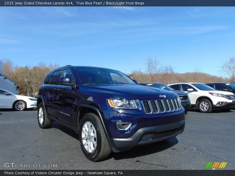 True Blue Pearl / Black/Light Frost Beige 2015 Jeep Grand Cherokee Laredo 4x4