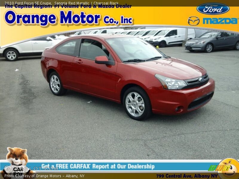 Sangria Red Metallic / Charcoal Black 2010 Ford Focus SE Coupe