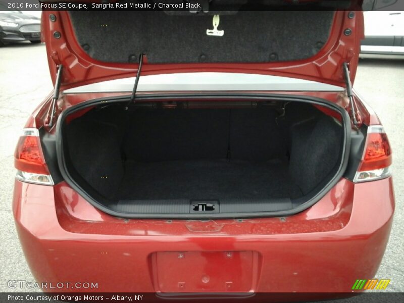 Sangria Red Metallic / Charcoal Black 2010 Ford Focus SE Coupe