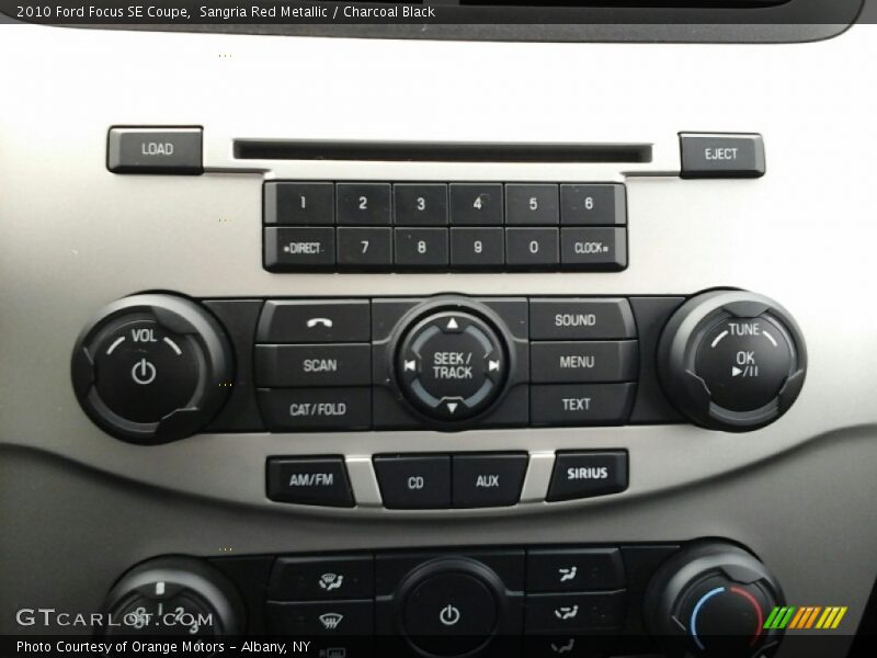 Sangria Red Metallic / Charcoal Black 2010 Ford Focus SE Coupe