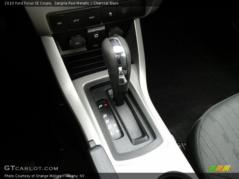 Sangria Red Metallic / Charcoal Black 2010 Ford Focus SE Coupe