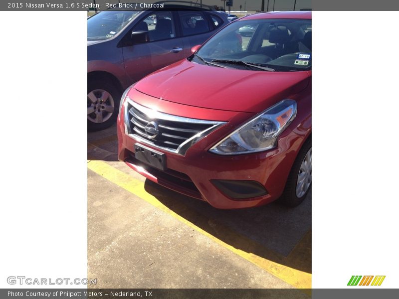 Red Brick / Charcoal 2015 Nissan Versa 1.6 S Sedan