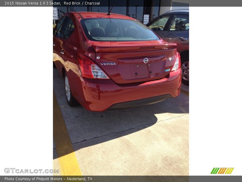 Red Brick / Charcoal 2015 Nissan Versa 1.6 S Sedan