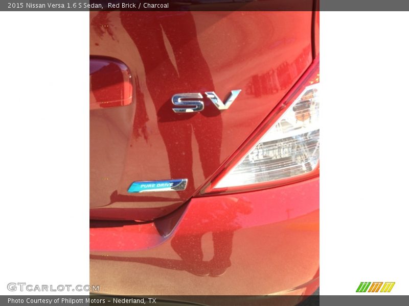 Red Brick / Charcoal 2015 Nissan Versa 1.6 S Sedan