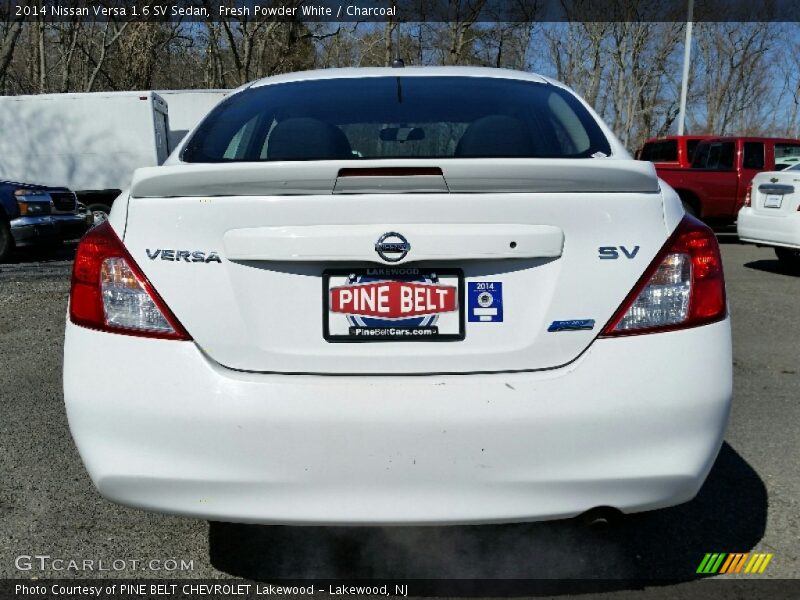 Fresh Powder White / Charcoal 2014 Nissan Versa 1.6 SV Sedan