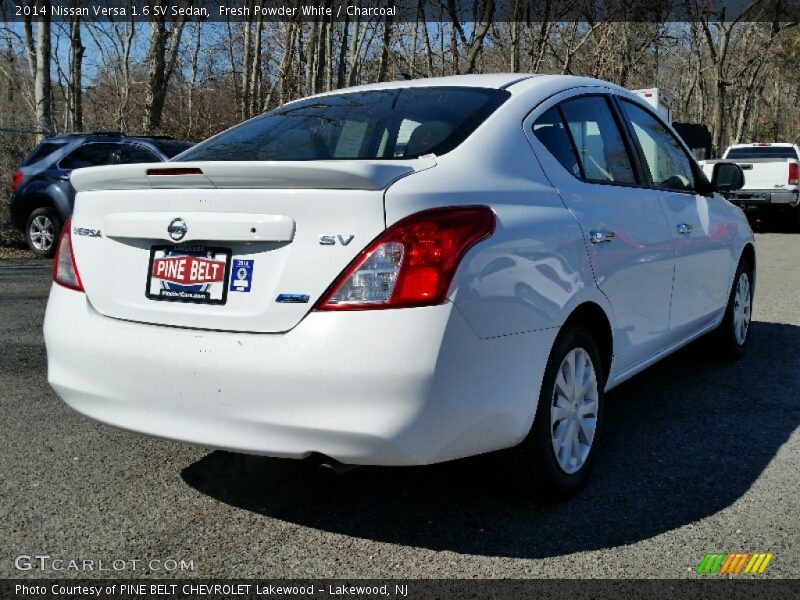 Fresh Powder White / Charcoal 2014 Nissan Versa 1.6 SV Sedan