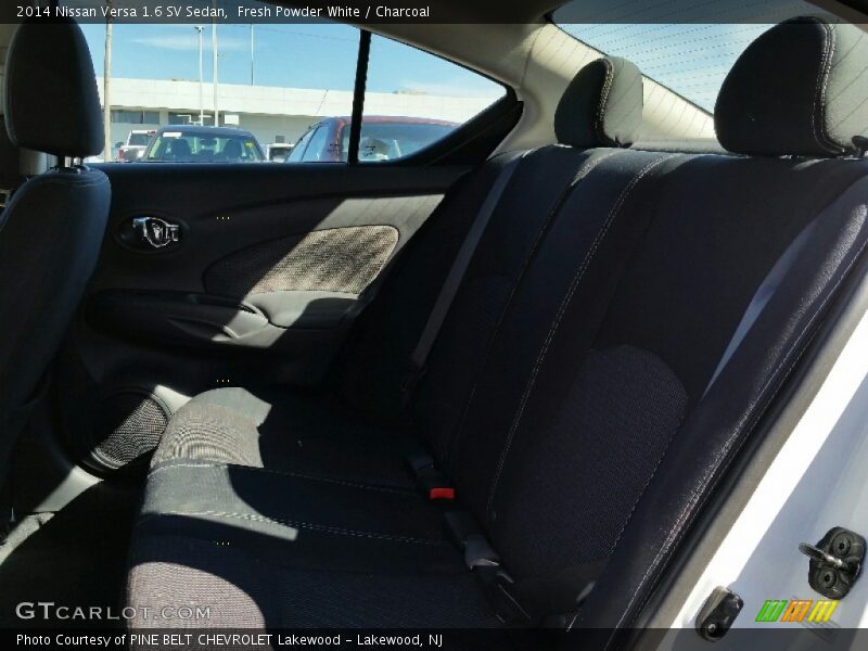 Fresh Powder White / Charcoal 2014 Nissan Versa 1.6 SV Sedan