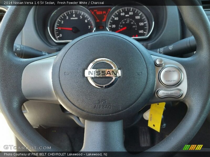 Fresh Powder White / Charcoal 2014 Nissan Versa 1.6 SV Sedan