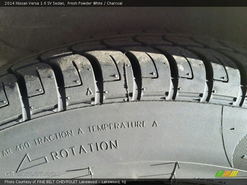 Fresh Powder White / Charcoal 2014 Nissan Versa 1.6 SV Sedan