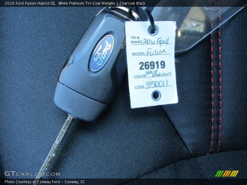 White Platinum Tri-Coat Metallic / Charcoal Black 2016 Ford Fusion Hybrid SE