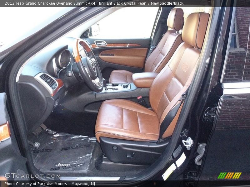 Brilliant Black Crystal Pearl / New Saddle/Black 2013 Jeep Grand Cherokee Overland Summit 4x4