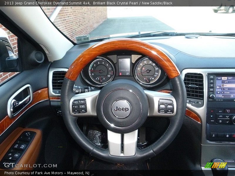 Brilliant Black Crystal Pearl / New Saddle/Black 2013 Jeep Grand Cherokee Overland Summit 4x4