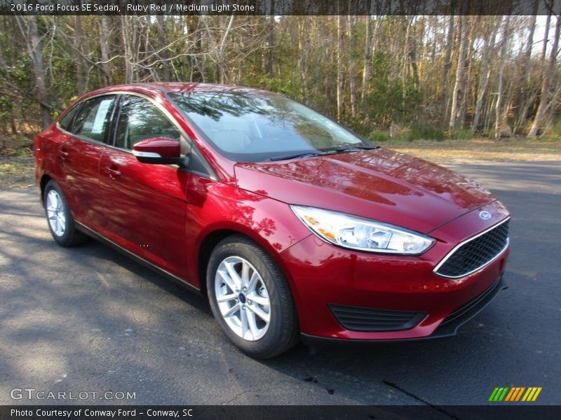 Ruby Red / Medium Light Stone 2016 Ford Focus SE Sedan