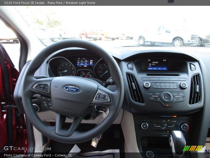Ruby Red / Medium Light Stone 2016 Ford Focus SE Sedan