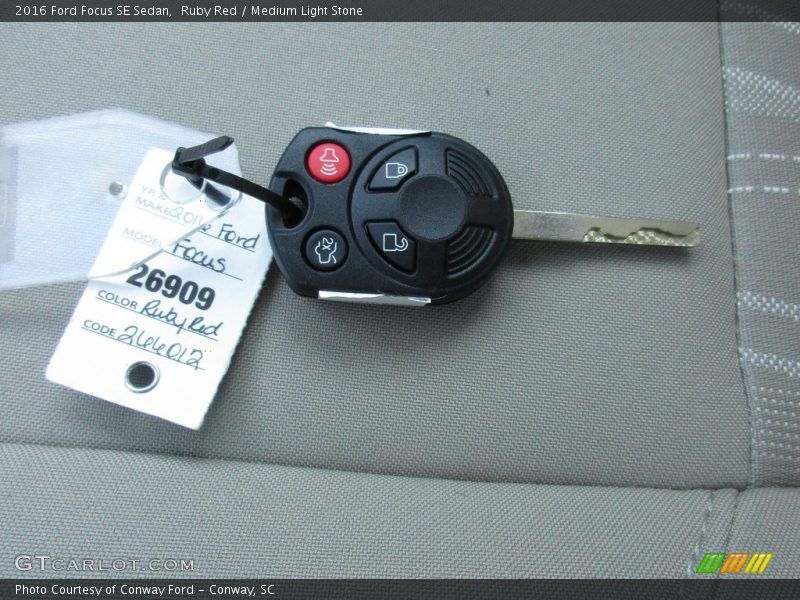 Ruby Red / Medium Light Stone 2016 Ford Focus SE Sedan