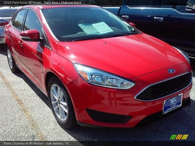 Race Red / Charcoal Black 2016 Ford Focus SE Sedan