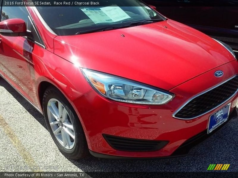 Race Red / Charcoal Black 2016 Ford Focus SE Sedan