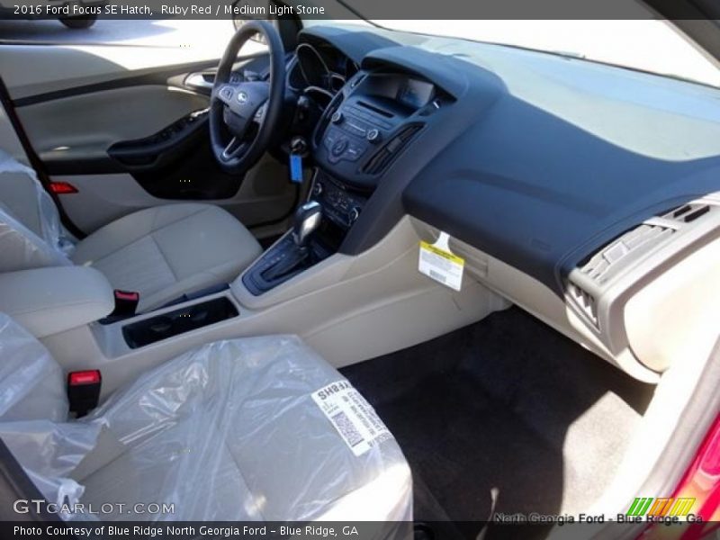 Ruby Red / Medium Light Stone 2016 Ford Focus SE Hatch