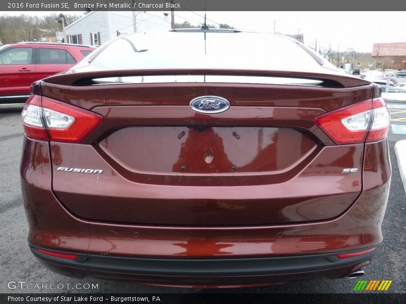 Bronze Fire Metallic / Charcoal Black 2016 Ford Fusion SE