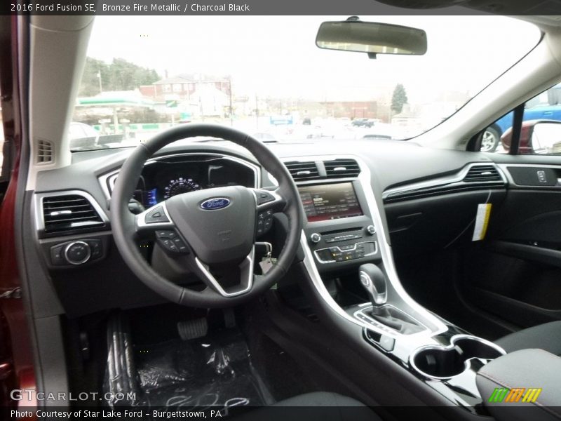 Bronze Fire Metallic / Charcoal Black 2016 Ford Fusion SE
