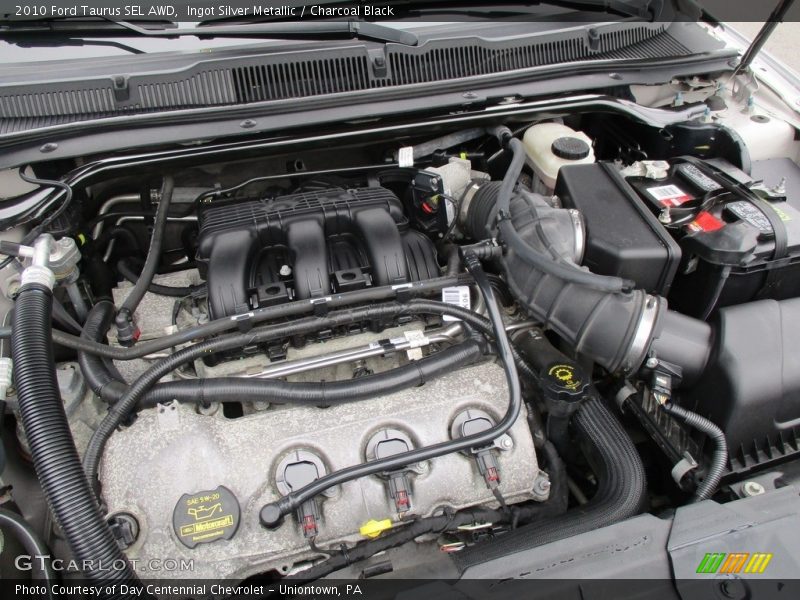 Ingot Silver Metallic / Charcoal Black 2010 Ford Taurus SEL AWD