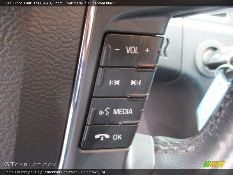 Ingot Silver Metallic / Charcoal Black 2010 Ford Taurus SEL AWD