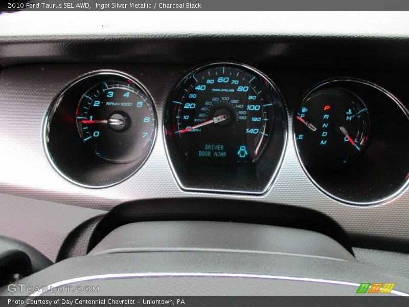 Ingot Silver Metallic / Charcoal Black 2010 Ford Taurus SEL AWD