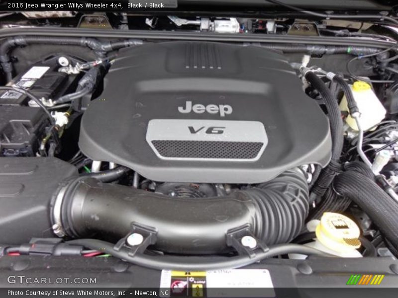 Black / Black 2016 Jeep Wrangler Willys Wheeler 4x4