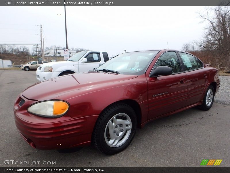 Redfire Metallic / Dark Taupe 2002 Pontiac Grand Am SE Sedan