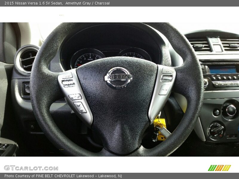 Amethyst Gray / Charcoal 2015 Nissan Versa 1.6 SV Sedan