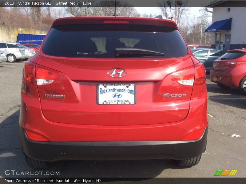 Garnet Red / Taupe 2013 Hyundai Tucson GLS