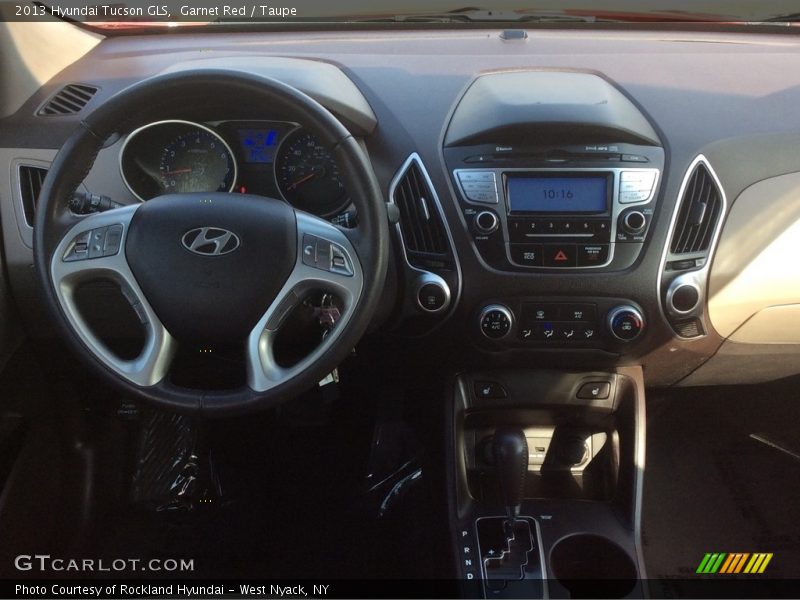 Garnet Red / Taupe 2013 Hyundai Tucson GLS