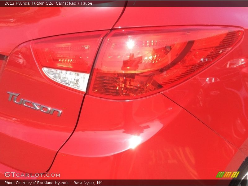 Garnet Red / Taupe 2013 Hyundai Tucson GLS