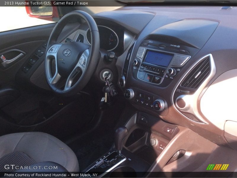 Garnet Red / Taupe 2013 Hyundai Tucson GLS