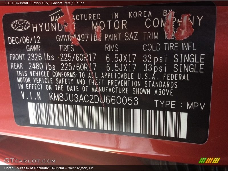 Garnet Red / Taupe 2013 Hyundai Tucson GLS