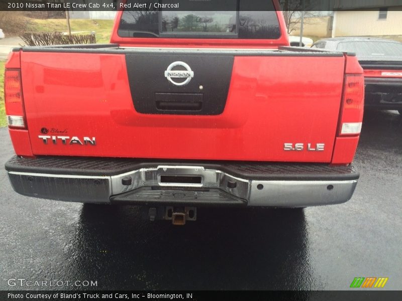 Red Alert / Charcoal 2010 Nissan Titan LE Crew Cab 4x4