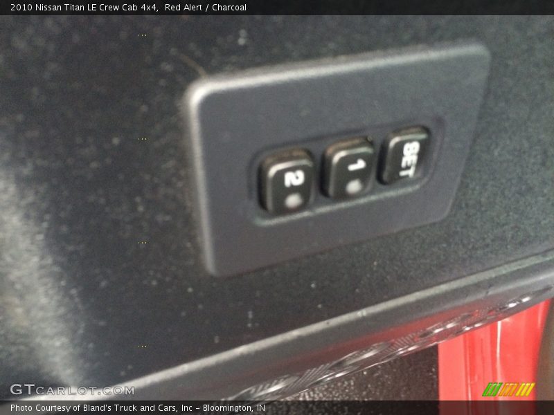 Red Alert / Charcoal 2010 Nissan Titan LE Crew Cab 4x4